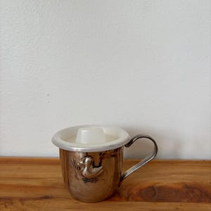 Silver plated baby cup with duck motif and  lid