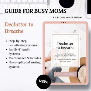 May include: A digital tablet displays a book cover titled "Declutter to Breathe." The cover features text and a minimalist design. The image includes the text "Guide for Busy Moms" and bullet points about decluttering systems.