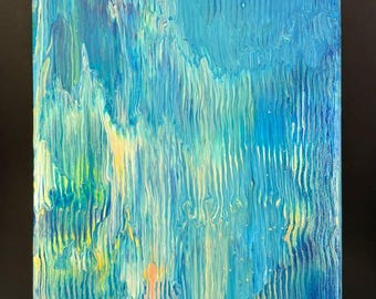 May include: Abstract painting on canvas with blue, green, and yellow colors. The paint is layered and textured, creating a flowing, watery effect.
