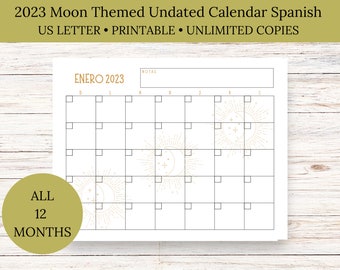 May include: A printable, undated calendar in Spanish with a moon and stars theme. The calendar is for January 2023 and features a gold moon and stars design. The calendar is US Letter size.