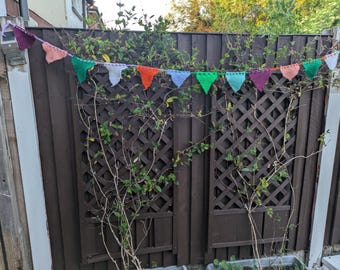 Colourful hand knitted bunting