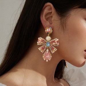 Exaggerated Pink Bow Earrings