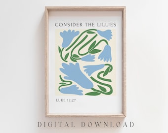May include: A printable art print with a beige background and a stylized illustration of blue lilies with green stems. The text "CONSIDER THE LILLIES" is at the top of the print and "LUKE 12:27" is at the bottom.