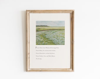 May include: Framed art print featuring a landscape painting of a field with blue and white flowers under a blue sky. The print includes a poem with the words "Praise God, from Whom all blessings flow."