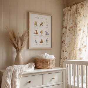 May include: A Winnie the Pooh themed nursery print with the text "God Says I Am" and a list of positive affirmations including "Loved", "Blessed", "Brave", "Forgiven", "Strong", "Known", "Unique", "Precious", and "Cared For".