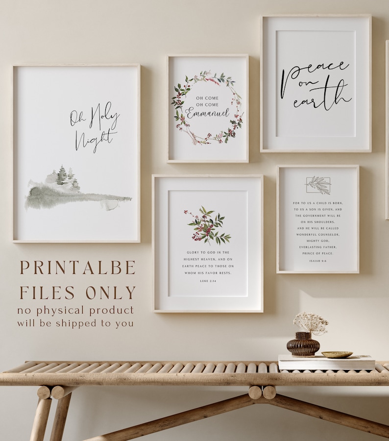May include: Set of six printable Christmas art prints with a white background and a rustic wood frame. The prints feature a watercolor illustration of a forest, a wreath with red berries, a scripture verse, and the words "Oh Holy Night", "Peace on Earth", and "Oh Come Oh Come Emmanuel".