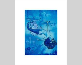 May include: A blue-toned watercolor print featuring a mermaid swimming downward with long flowing hair. The scene includes two sharks swimming above, several jellyfish, and coral formations at the bottom. The artist signature DIGATI is visible.