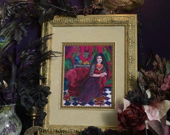May include: A framed illustration featuring a person with long dark hair sitting on a deep red velvet armchair. The person wears a red top and a long dark skirt. The background includes a vibrant pink wall, a blue mask, and a black and white checkered floor.