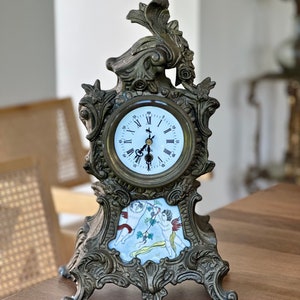Ornate Bronze Mantle Clock with Cherubs