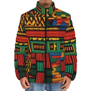 May include: A black zip-up jacket with a colourful geometric pattern in shades of red, yellow, green, and blue. The pattern is reminiscent of African textiles.