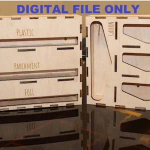 May include: A wooden organizer with labeled compartments for storing different types of food wrap, including plastic, parchment, foil, gallon, quart, sandwich, and snack.