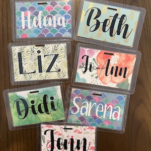 Badge backer name tag for badge reel
