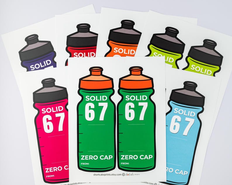 May include: A selection of water bottle stickers in shades of green, pink, blue, orange, and purple. Each sticker displays the word "SOLID" and the number "67" or the words "ZERO CAP". The stickers are presented against a white backdrop.
