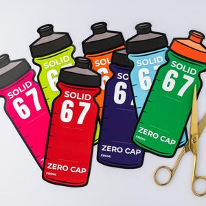 May include: A selection of vibrant water bottle-shaped stickers, each displaying the word "SOLID" and the number "67". The stickers come in various colours: pink, red, orange, green, blue, and yellow. The text "ZERO CAP" is also printed on the stickers.