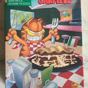 Garfield Lasagna Dinner gouden legpuzzel (100 stukjes)