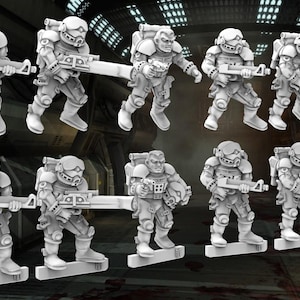May include: A set of ten white plastic miniature figures of soldiers wearing helmets and carrying rifles. The figures are posed in various action stances.