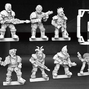 May include: A collection of miniature science fiction figures, each standing on a small rectangular base. The figures are in various poses, holding weapons and wearing futuristic armor. A large, rectangular structure is also included.