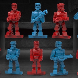 May include: Ten toy robots, five red and five blue, standing in two rows of five. Each robot has a different weapon or tool, such as a wrench, a gun, or a sword.