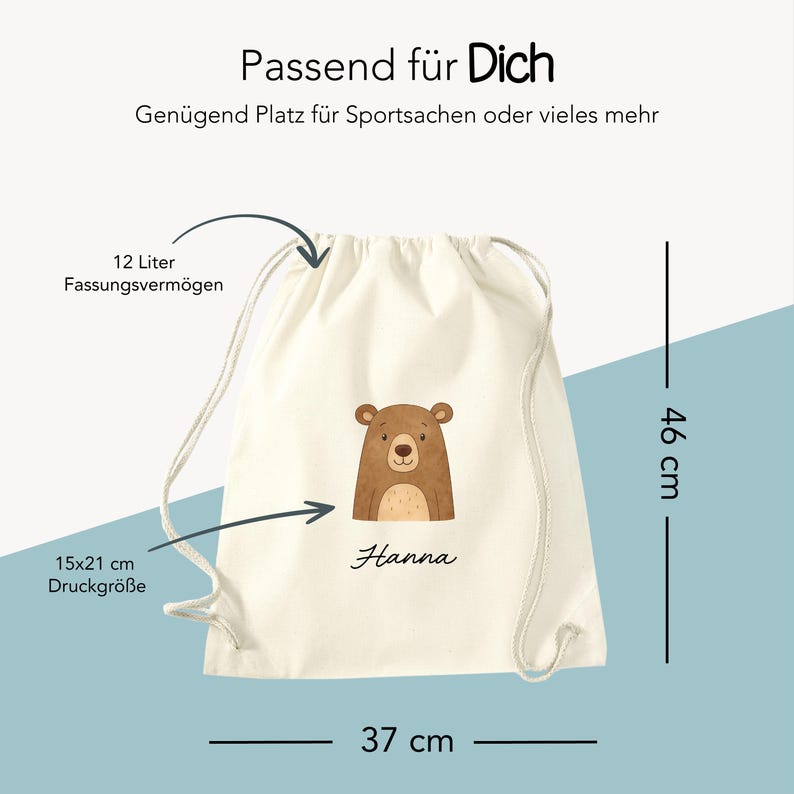 Puede incluir: Una bolsa con cord&oacute;n de color crema con un gr&aacute;fico de oso marr&oacute;n y el nombre "Hanna". La bolsa mide 37 cm de ancho y 46 cm de alto, con una capacidad de 12 litros. El &aacute;rea de impresi&oacute;n es de 15x21 cm. El texto "Passend f&uuml;r Dich" est&aacute; en la parte superior.