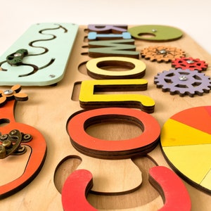 Wooden Name Busyboard with Personalisation for Kids - Educational ToddlerPuzzle by WittleWood - Gift for Baby Shower Easter Birthday