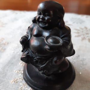 A traditional Chinese LAUGHING BUDDHA figurine