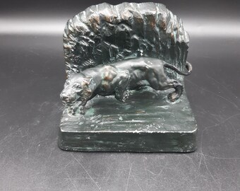 Bokstöd i vintage-metall, panter