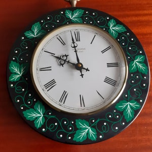 Germany Junghans ATO-MAT wall clock with leves decoration