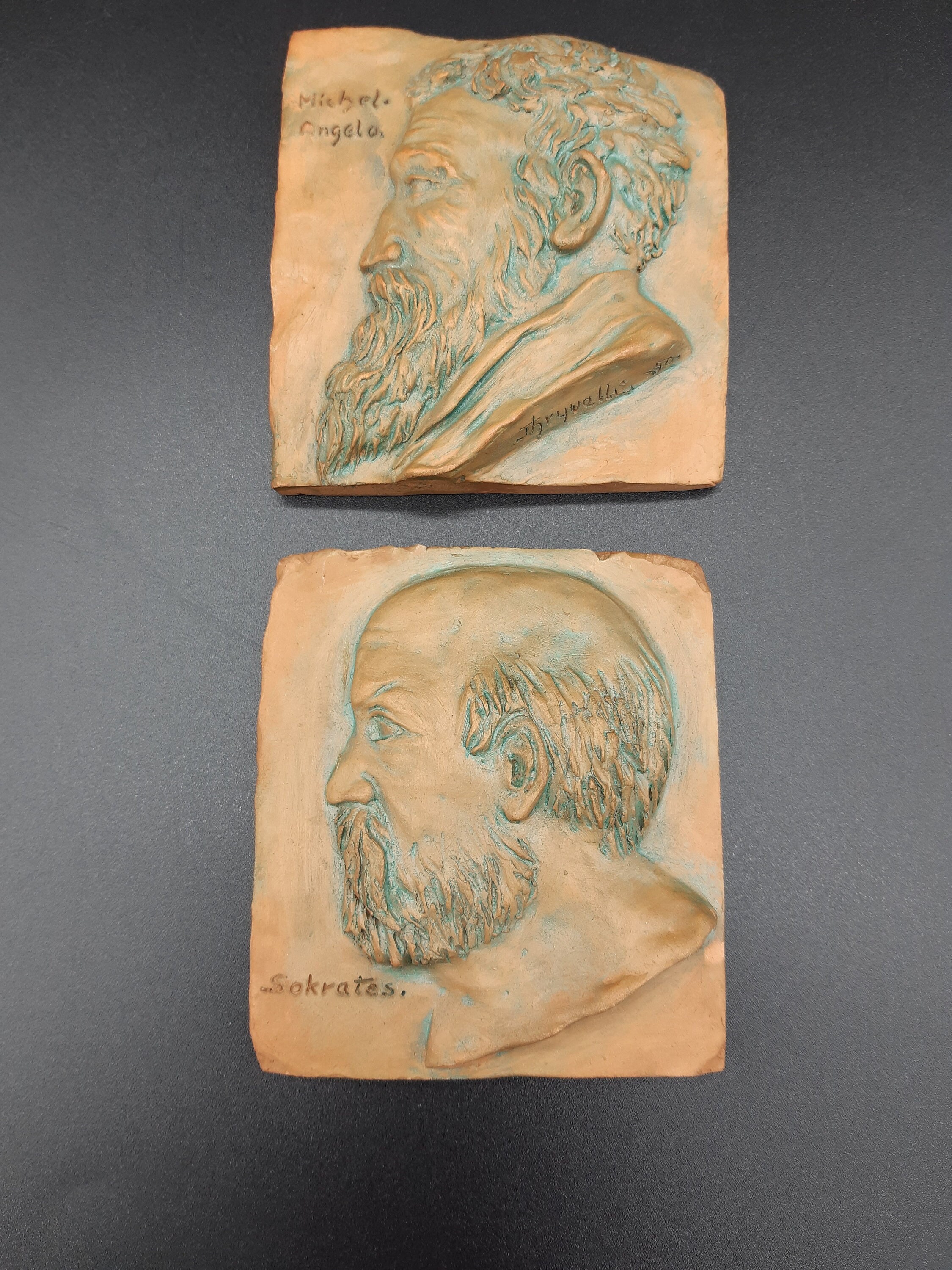 Set of 2 Arne Thryvelli earthenware plaques Ceramic wall hangings Socrates Michelangelo