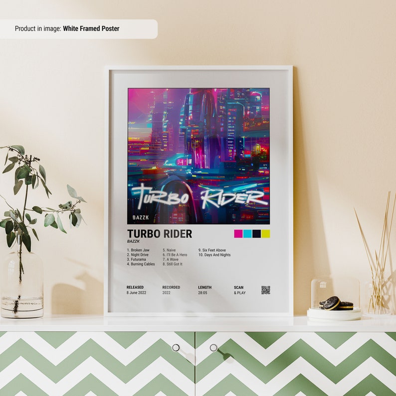 May include: A white framed poster with a colorful illustration of a futuristic city and a car. The poster has the title "Turbo Rider" and the artist's name "BAZZK". The poster also includes the album's tracklist, release date, recording date, length, and a QR code to scan and play.