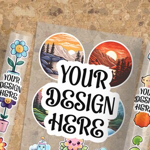 May include: A sheet of clear sticker paper with various designs. The designs include a flower, a mountain landscape, a sunset, a cute cartoon character, and the text "YOUR DESIGN HERE".