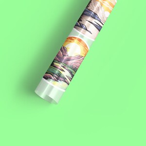 May include: A roll of wrapping paper with a repeating pattern of colourful mountain landscapes. The paper is rolled up and the end is visible, showing the design.
