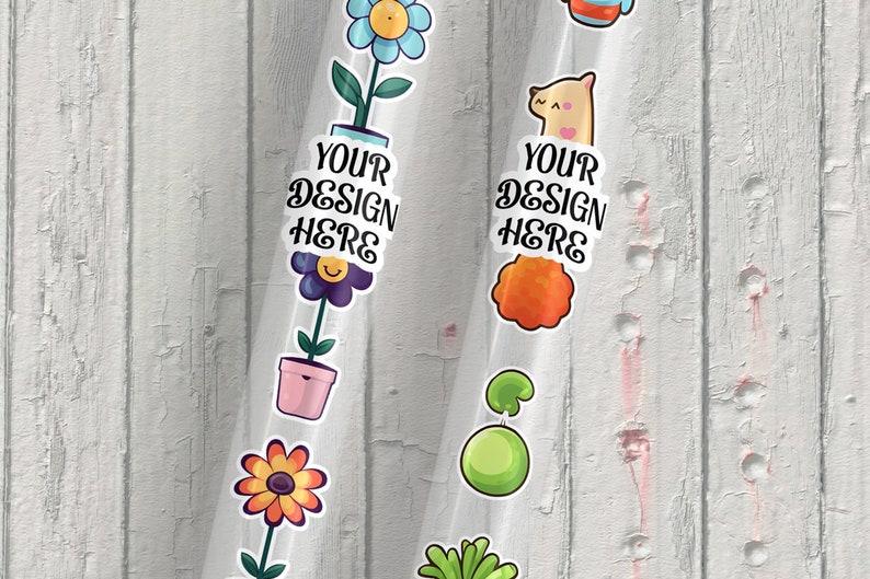 May include: Two clear plastic sheets with colorful stickers on a white wood background. The stickers feature a flower, a pot, a smiley face, a cat, a cloud, a mushroom, and the text "YOUR DESIGN HERE".