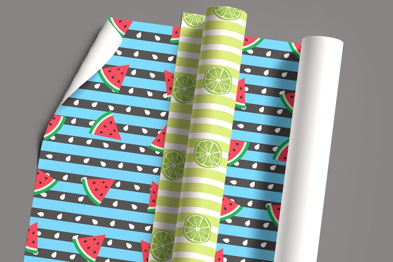 May include: Three rolls of wrapping paper with a summer fruit theme. One roll has a blue and black striped background with white watermelon slices and seeds. Another roll has a green and white striped background with lime slices. The third roll is white.