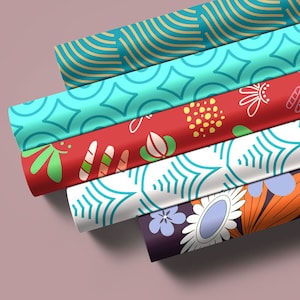 May include: Five rolls of wrapping paper with different colorful patterns. The patterns include geometric shapes, flowers, and abstract designs.