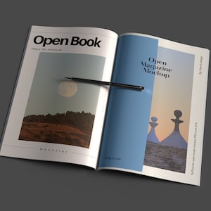 May include: Open book mockup with a black pen on top. The left page features a landscape photo of a hill with a large moon in the sky. The right page features a blue background with a photo of two white buildings with a sunset in the background. The text "Open Magazine Mockup" is printed on the right page.