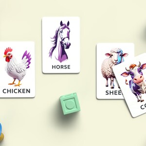 May include: A set of five flashcards featuring different farm animals. The cards are white with colourful illustrations of a horse, chicken, sheep, and cow. Each card has the name of the animal printed below the image in black text.