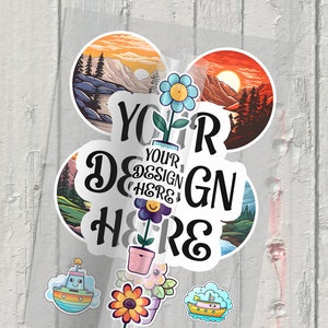 May include: A set of colorful stickers featuring nature scenes, flowers, and boats. The stickers are on a white wood background. The text "YOUR DESIGN HERE" is written in black on a white sticker.