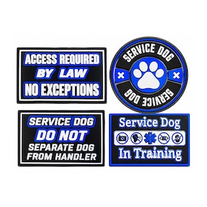 May include: A set of four black, blue, and white patches. One rectangular patch reads ACCESS REQUIRED BY LAW NO EXCEPTIONS. A circular patch features a paw print and SERVICE DOG text. Another rectangular patch reads SERVICE DOG DO NOT SEPARATE DOG FROM HANDLER. The final patch reads Service Dog In Training with icons.