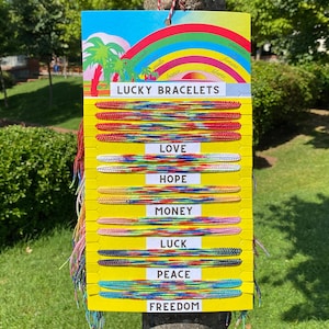 Geluksarmbanden set van 100, liefde, hoop, geld, geluk, vrede, vrijheid, Portafortuna Brasiliani, regenboog vriendschapsarmband