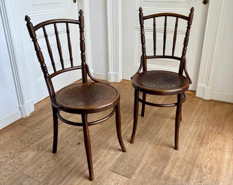 a Pair of authentic bentwood chairs with bobbin design