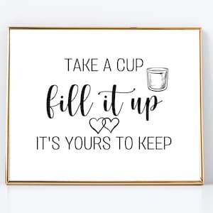 May include: A framed print with gold trim and a white background. The black text reads "TAKE A CUP, FILL IT UP, IT'S YOURS TO KEEP" with a cup illustration and two hearts.