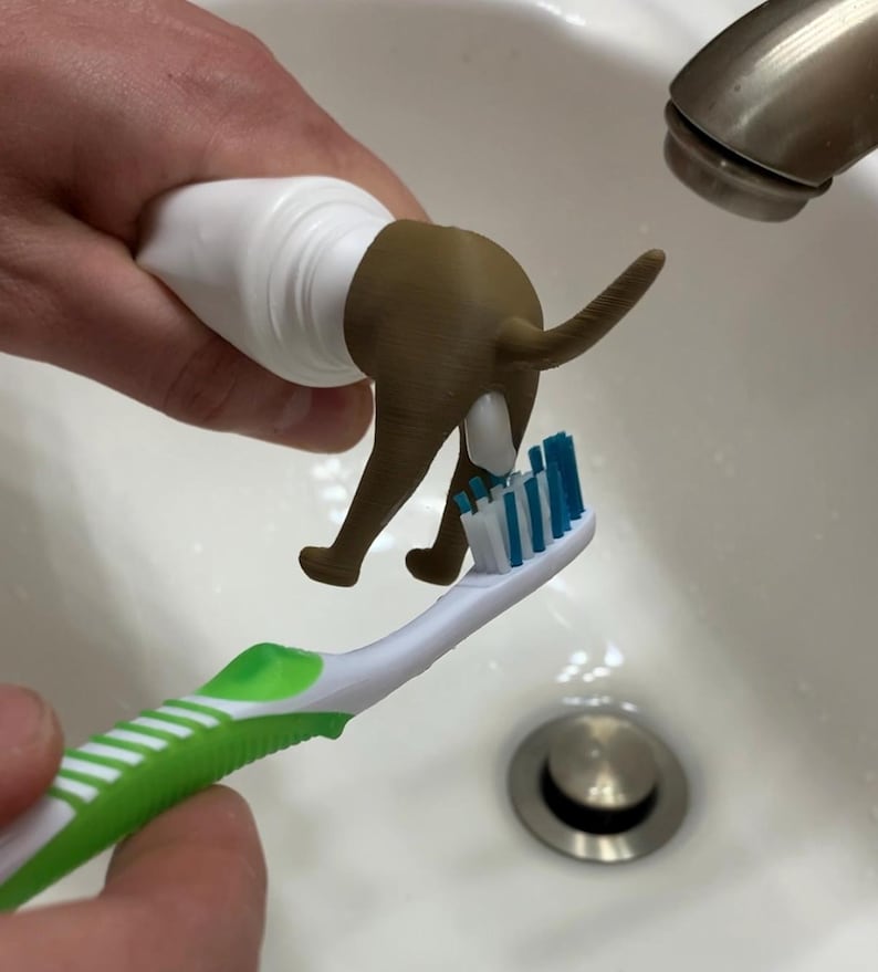 Pooping Dog Butt Toothpaste Topper: Funny Gag Gift for Dog Lovers image 1