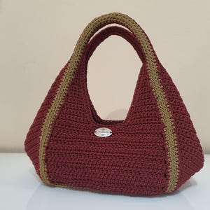 Handgefertigte weinrote Handtasche