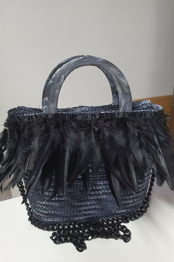 Borsetta in rafia e piume Italia