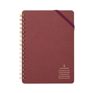May include: A burgundy A6 ring memo notebook with gold spiral binding and a matching elastic closure. The notebook features the text "KLEID NOTES" and other details. The notebook contains 70 sheets of kraft paper.