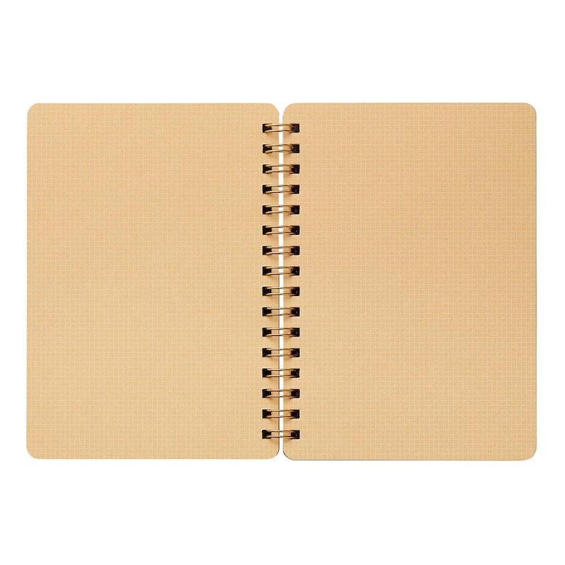 May include: An open, spiral-bound notebook with a grid pattern on the pages. The pages are a light tan color, and the spiral binding is gold. The notebook is shown against a white background.
