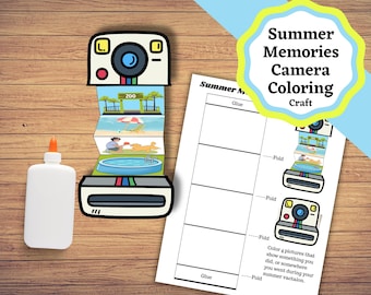 May include: A Summer Memories Camera Coloring Craft kit featuring a paper camera cutout with an accordion-style insert showing illustrations of a zoo, beach, park, and pool, alongside a white glue bottle and a printed instruction sheet with text.