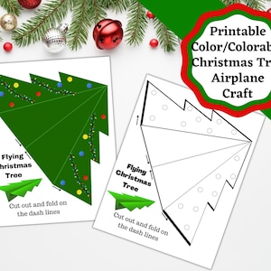 May include: Printable Christmas tree aeroplane craft template. The template is a black and white outline of a Christmas tree with dotted lines for folding. The template is labelled "Flying Christmas Tree" and includes instructions to cut out and fold on the dash lines.