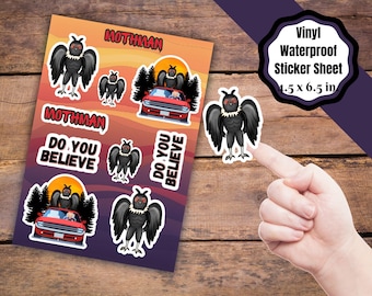 May include: A 4.5 x 6.5 inch vinyl waterproof sticker sheet featuring Mothman illustrations, including a creature with black wings and red eyes, a red car with a driver, and the text Mothman and Do You Believe in a dark orange and purple gradient.
