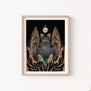 May include: A framed art print featuring a stylized loon with wings spread wide against a black starry sky. The bird has a speckled body, a green neck, and a long beak. Above the loon is a full moon, and below are dark, abstract plant-like shapes.